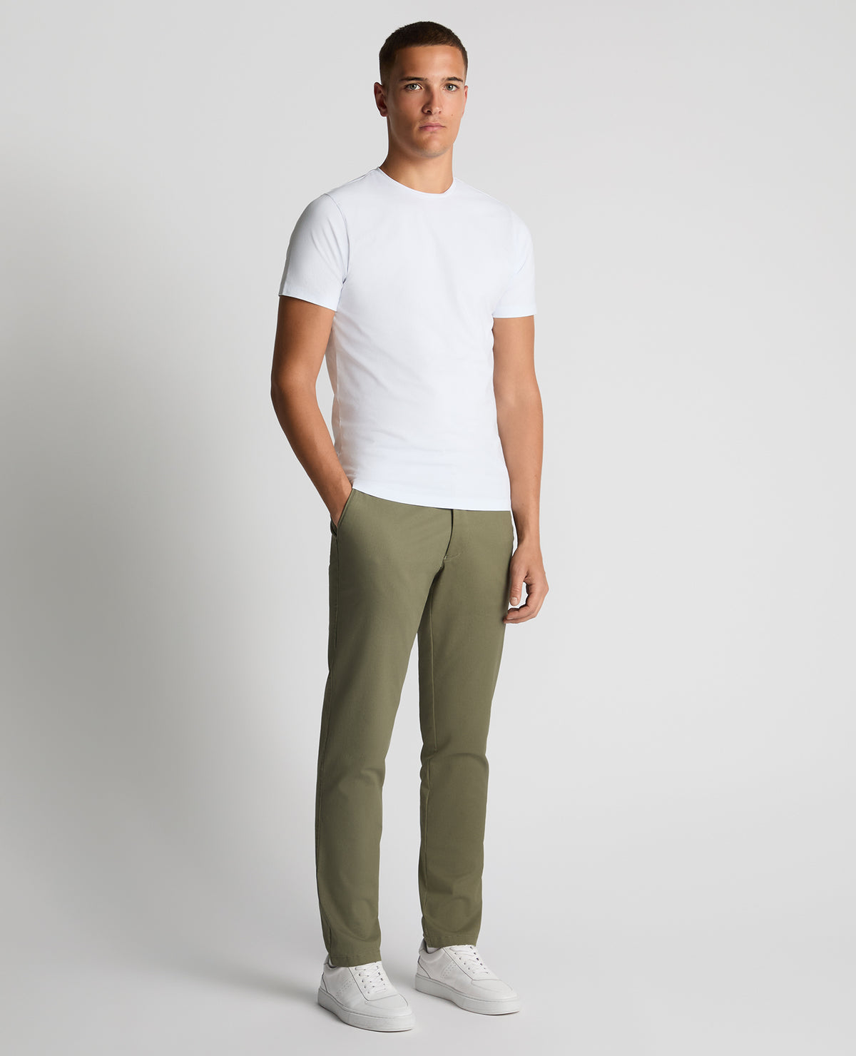 Man wearing a green Slim Leg Cotton-Stretch Chinos