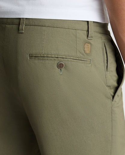 Man wearing a green Slim Leg Cotton-Stretch Chinos