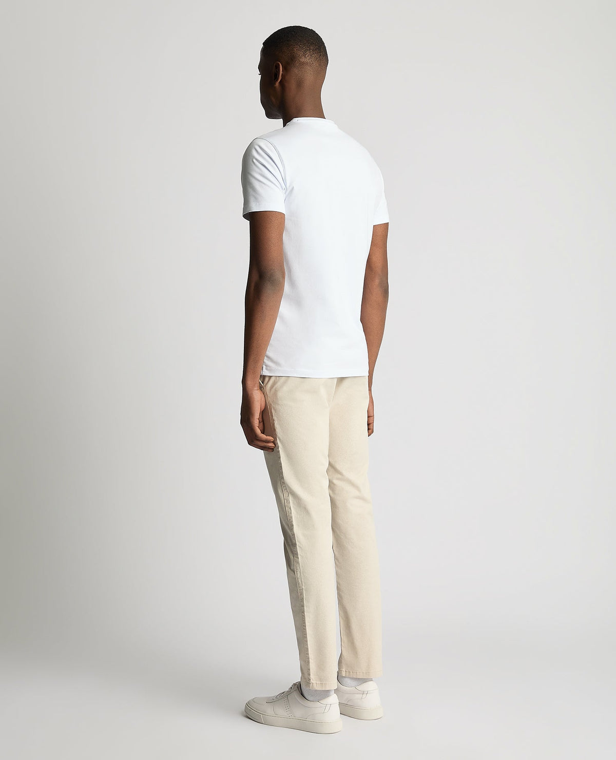Man wearing a sand Slim Leg Cotton Stretch Chinos