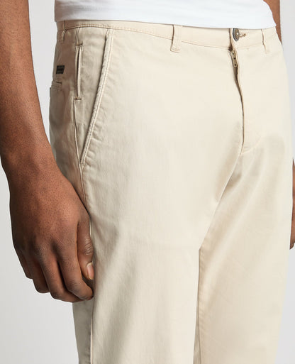 Man wearing a sand Slim Leg Cotton Stretch Chinos