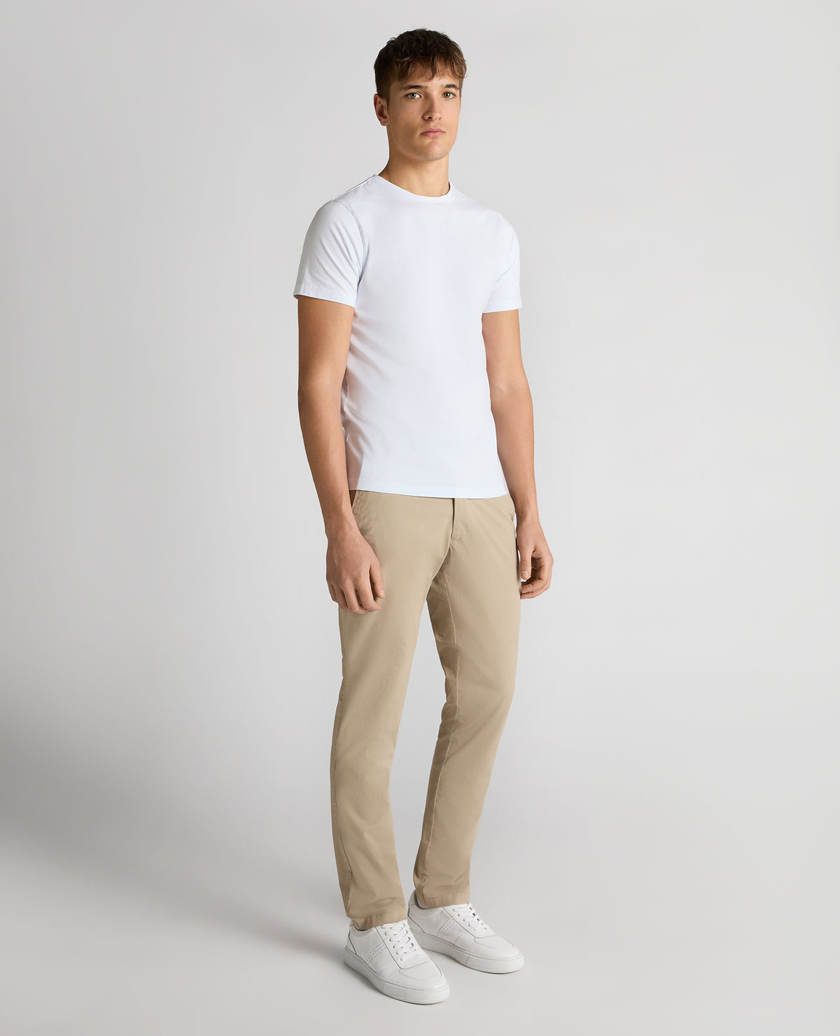 Man wearing a sand Slim Leg Cotton Stretch Chinos