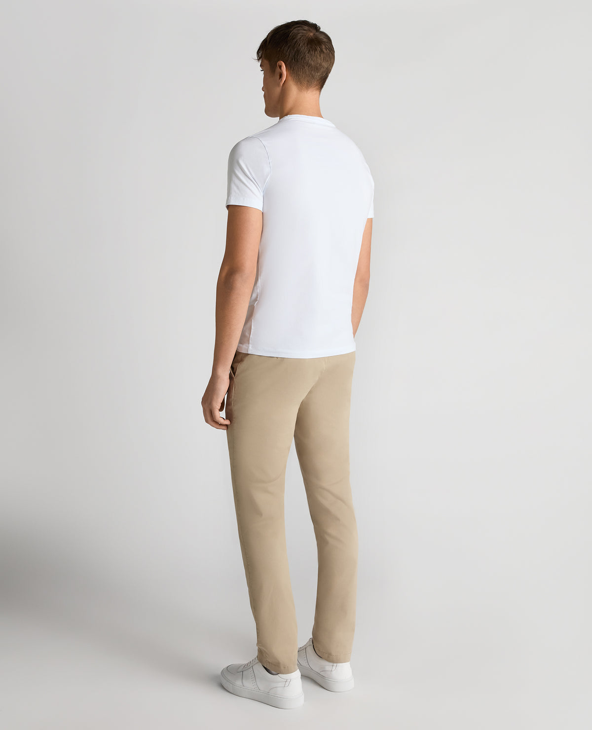 Man wearing a sand Slim Leg Cotton Stretch Chinos