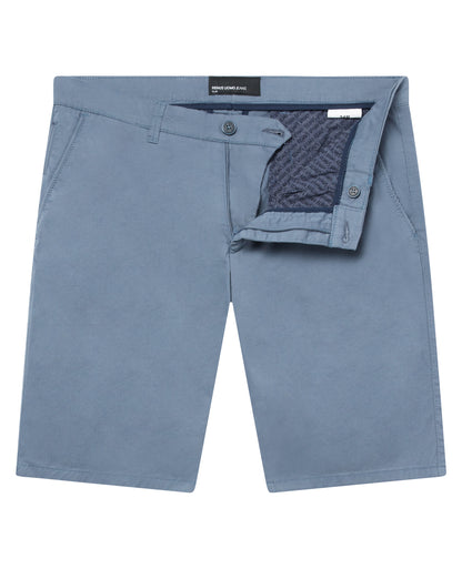Man wearing a blue Slim Leg Cotton-Stretch Chino Short