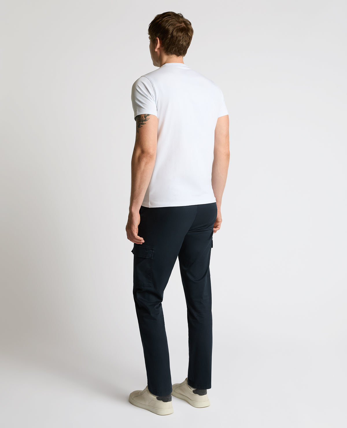 Man wearing a blue Slim Leg Cotton-Stretch Eton Cargos