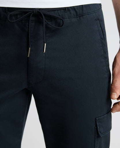 Man wearing a blue Slim Leg Cotton-Stretch Eton Cargos