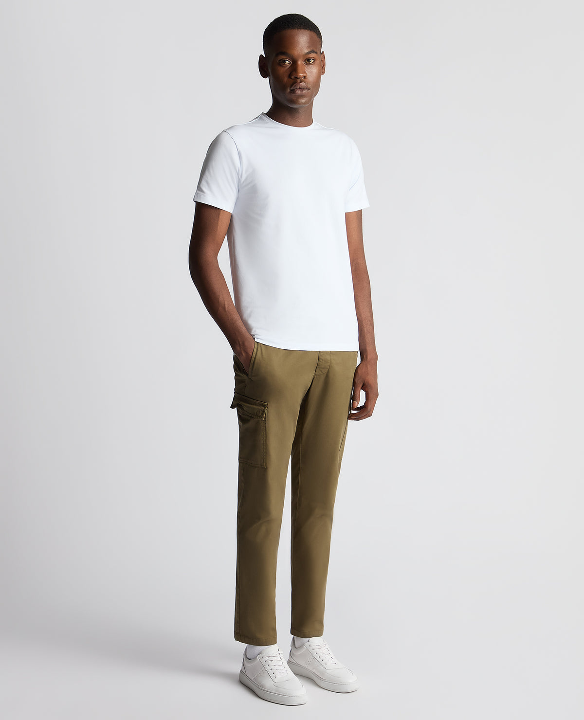 Man wearing a green Slim Fit Cotton Stretch Cargos