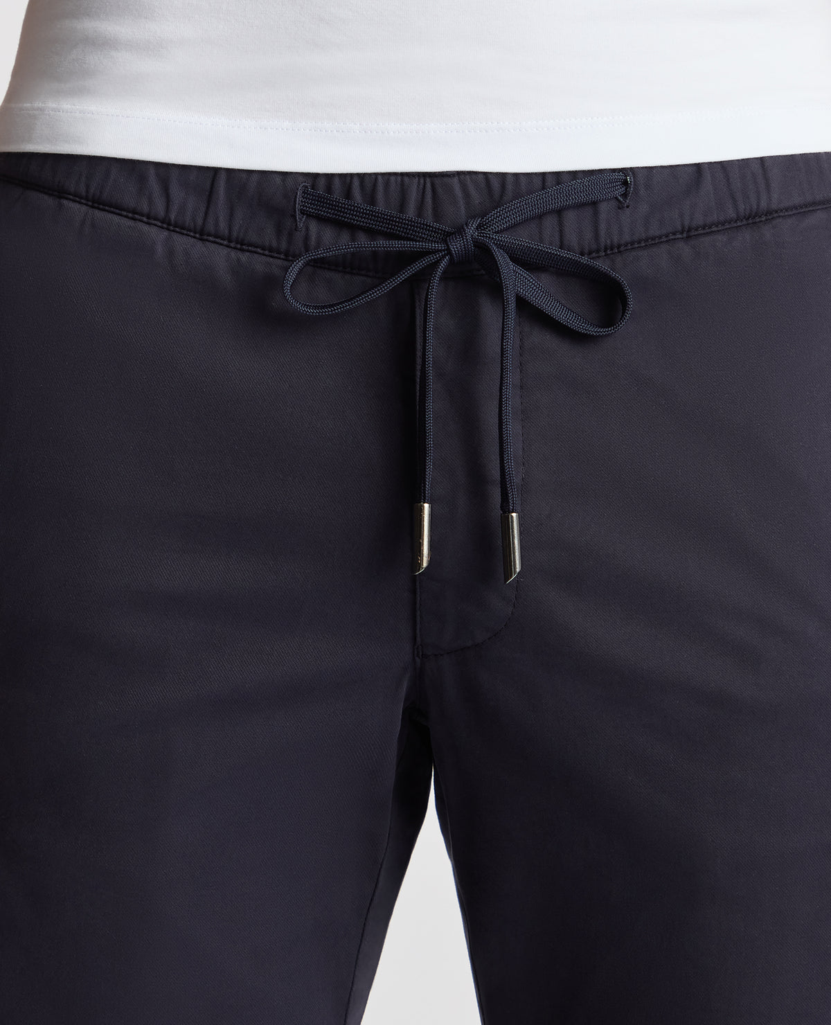 Man wearing a navy Slim Fit Cotton Stretch Cargos
