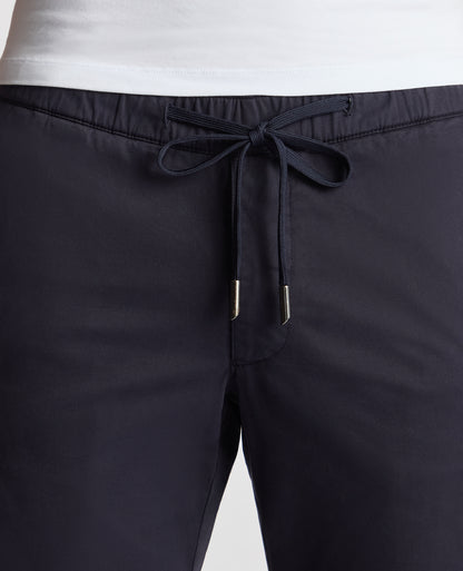 Man wearing a navy Slim Fit Cotton Stretch Cargos