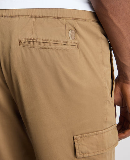Man wearing a sand Slim Fit Cotton Stretch Cargos