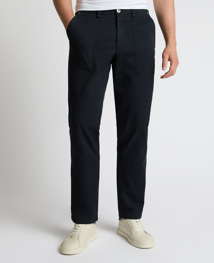 Man wearing a navy Straight Leg Cotton-Stretch Carpenter Pant