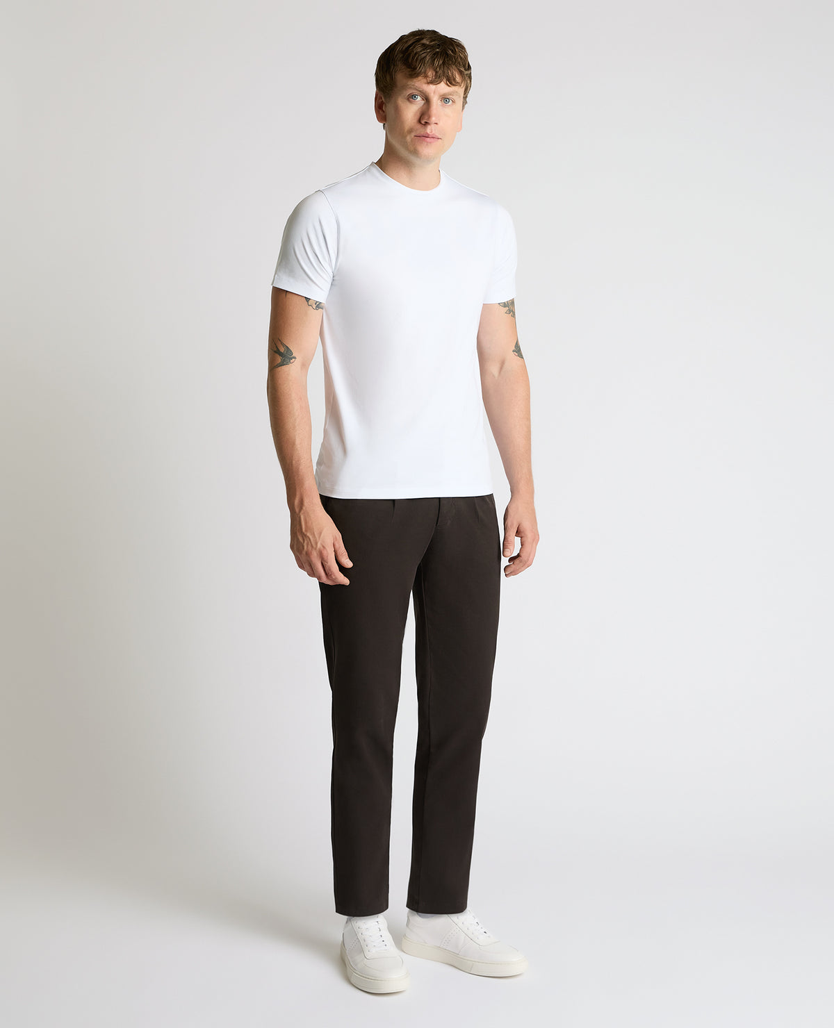 Man wearing a brown Straight Leg Cotton-Stretch Riley Chinos