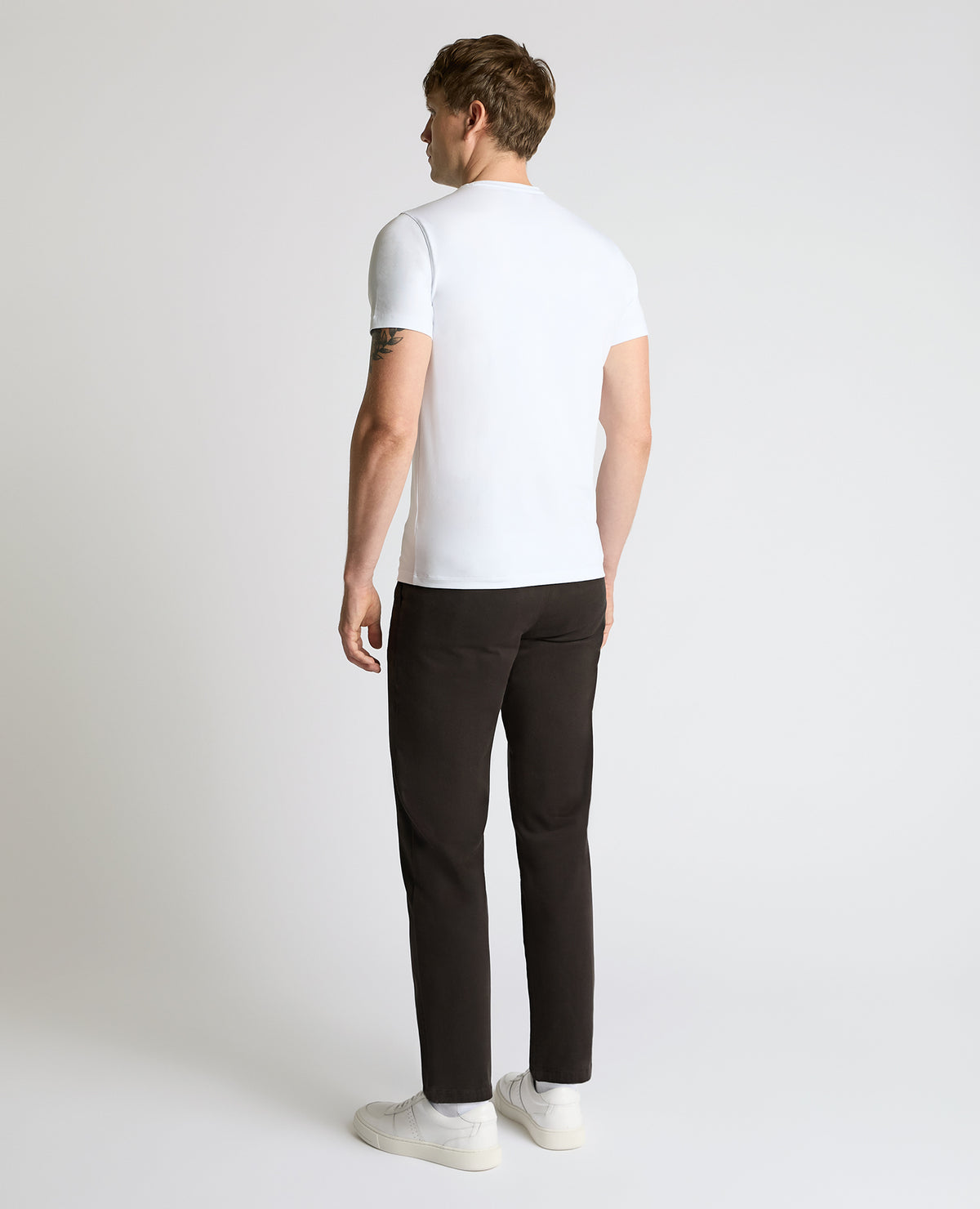 Man wearing a brown Straight Leg Cotton-Stretch Riley Chinos