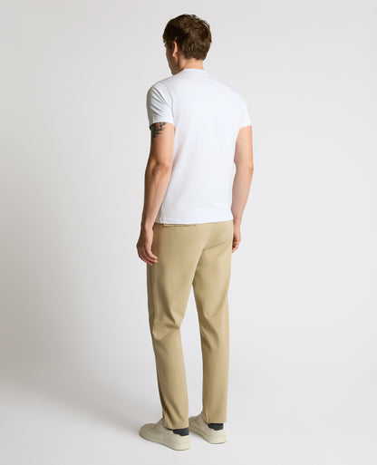 Man wearing a sand Straight Leg Cotton-Stretch Riley Chinos