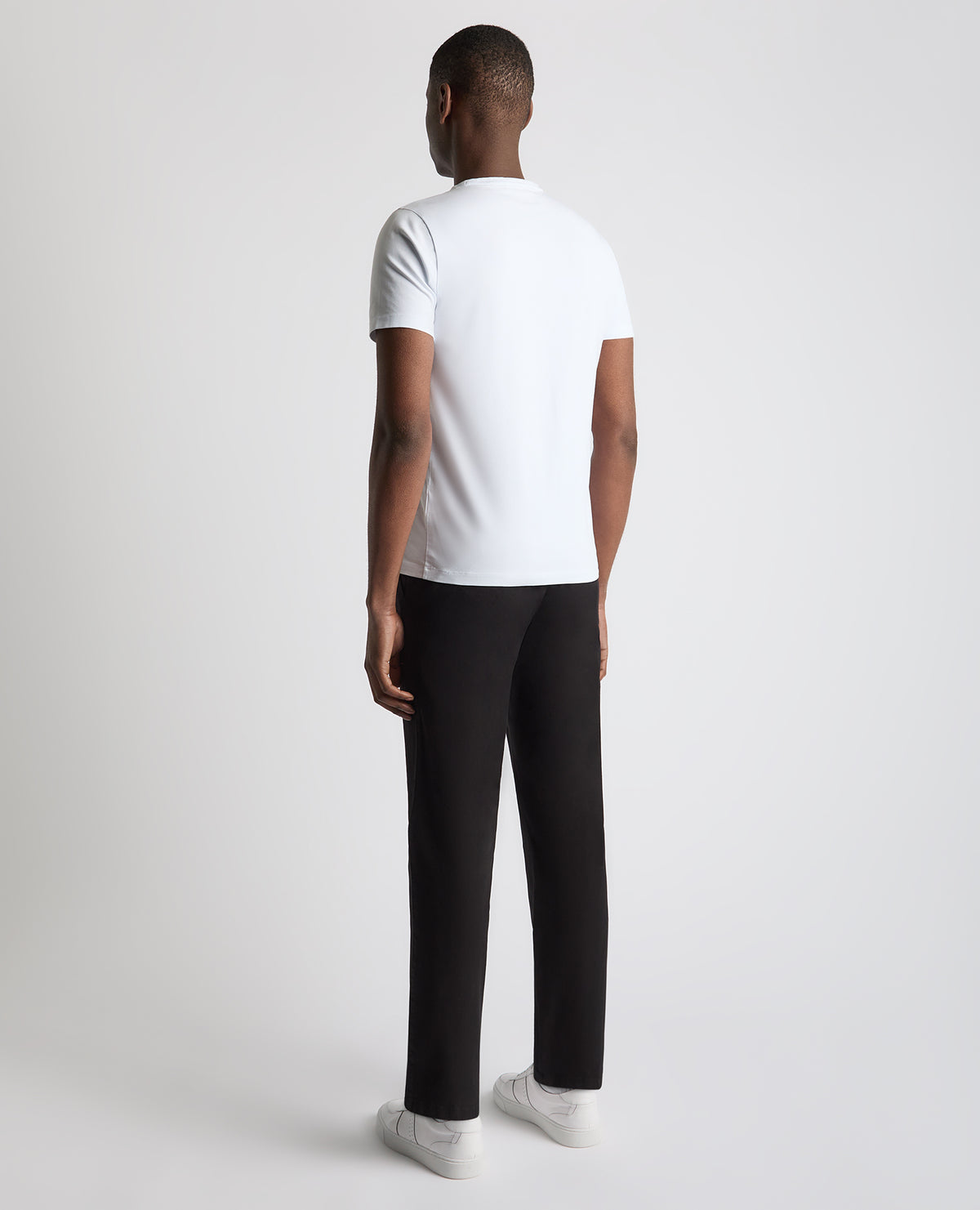 Man wearing a black Straight Leg Cotton Stretch Chino