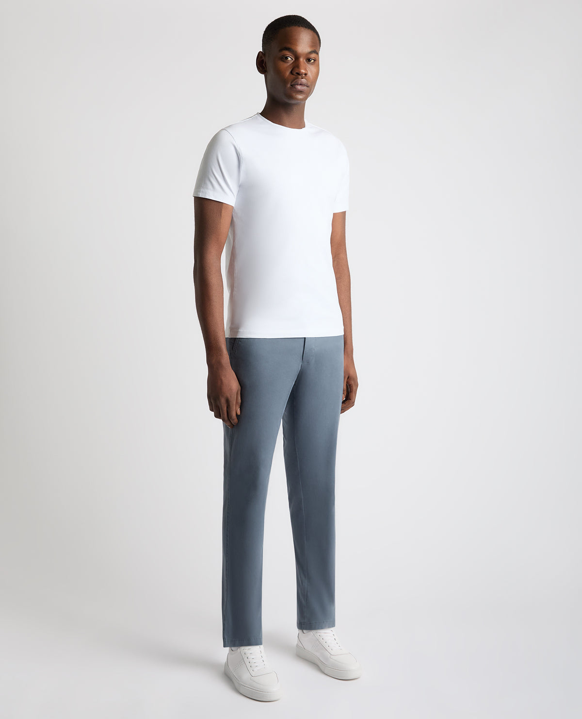 Man wearing a blue Straight Leg Cotton Stretch Chino