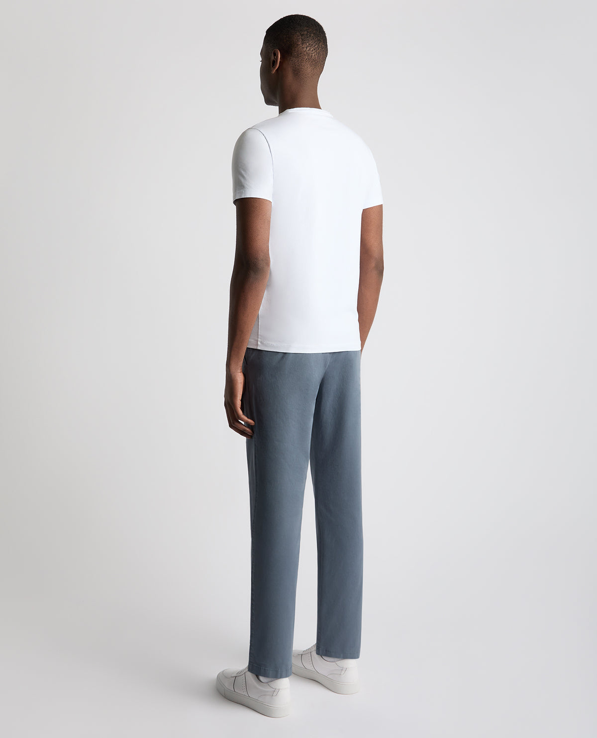 Man wearing a blue Straight Leg Cotton Stretch Chino