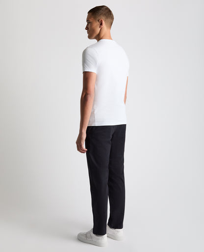 Man wearing a navy Straight Leg Cotton Stretch Chino