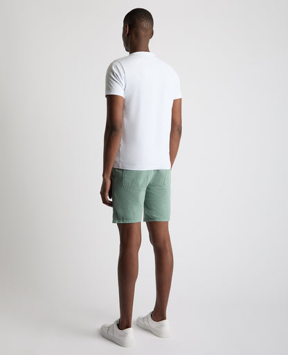 Man wearing a green Slim Fit Cotton-Linen Shorts