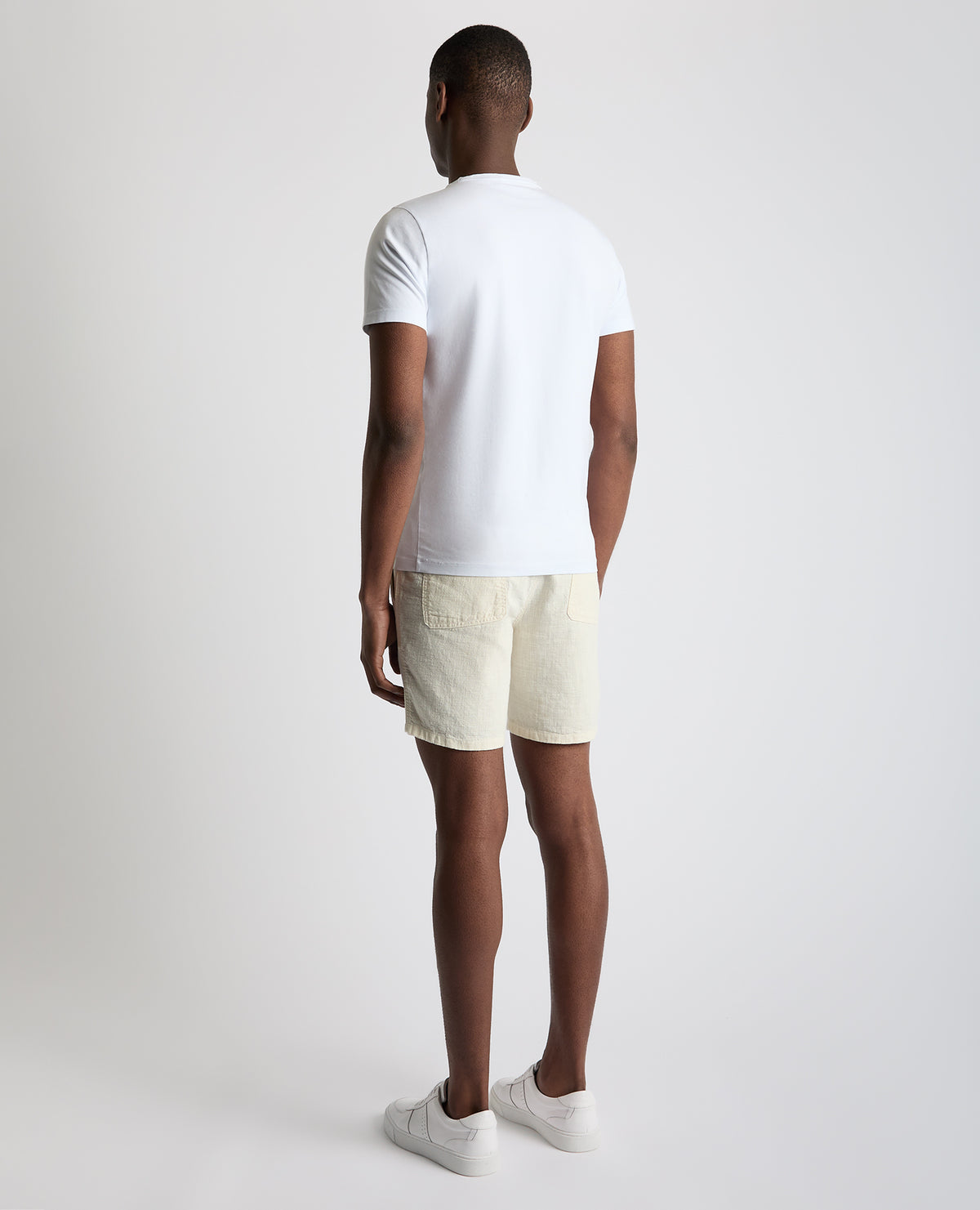 Man wearing a sand Slim Fit Cotton-Linen Shorts