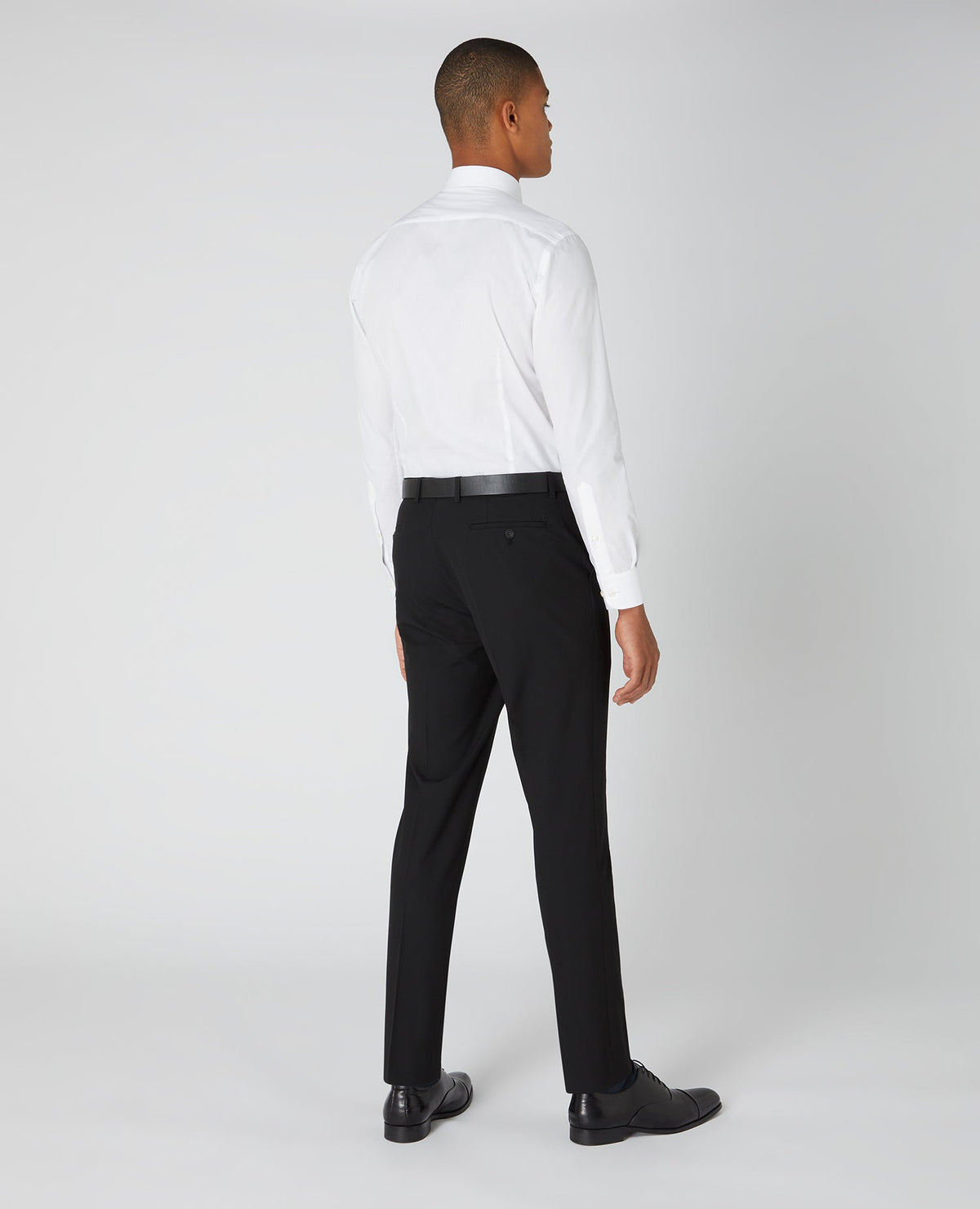 Man wearing a black Slim Leg Formal Trousers