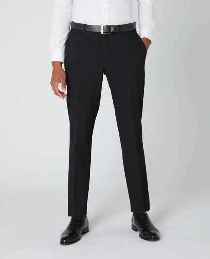 Man wearing a black Tapered Fit Formal Trousers