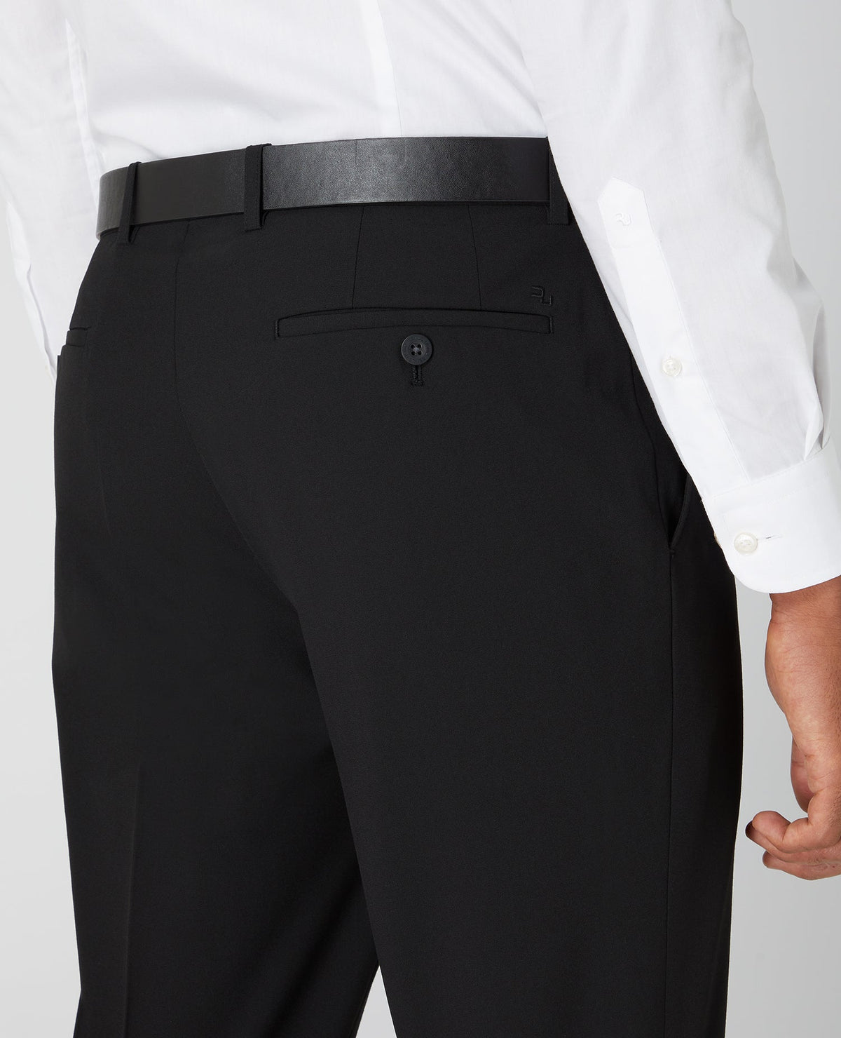 Man wearing a black Tapered Fit Formal Trousers