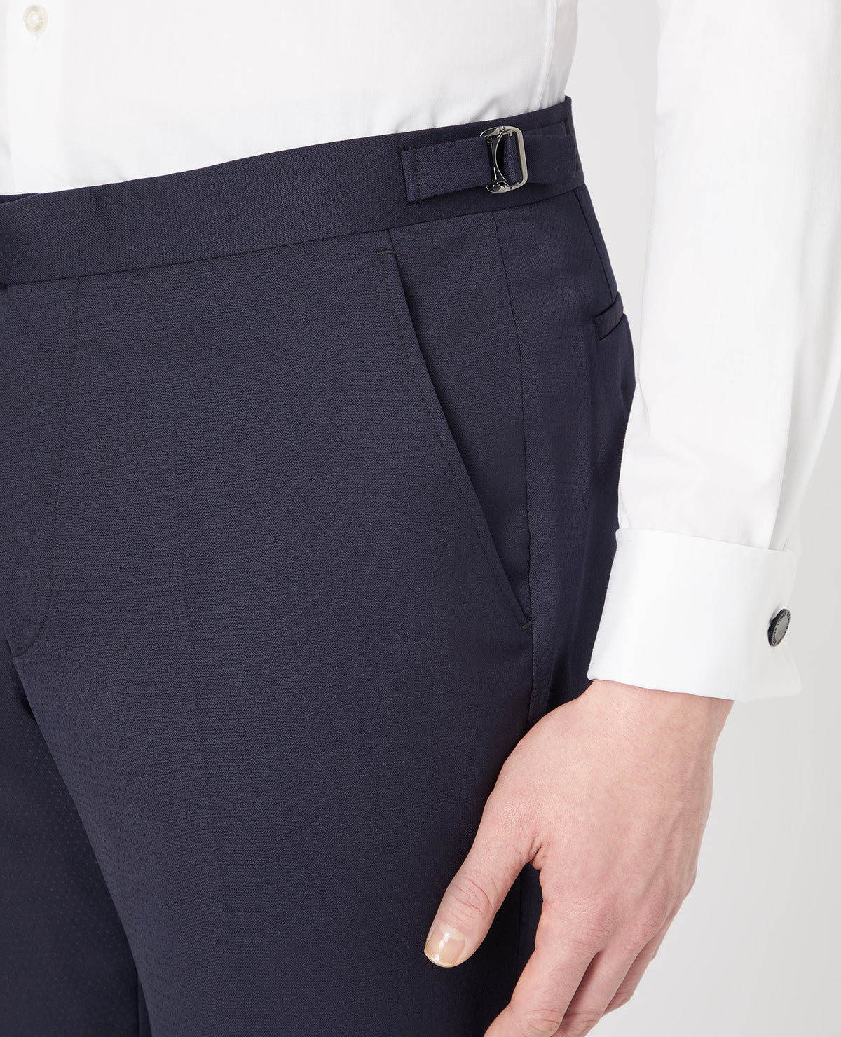 Man wearing a navy Slim Fit Wool-Rich Mix and Match Dinner Suit Trousers