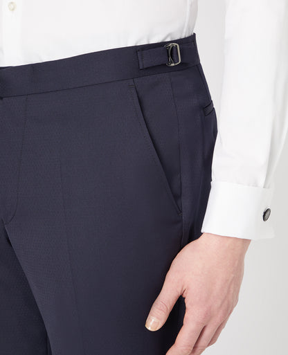 Man wearing a navy Slim Fit Wool-Rich Mix and Match Dinner Suit Trousers