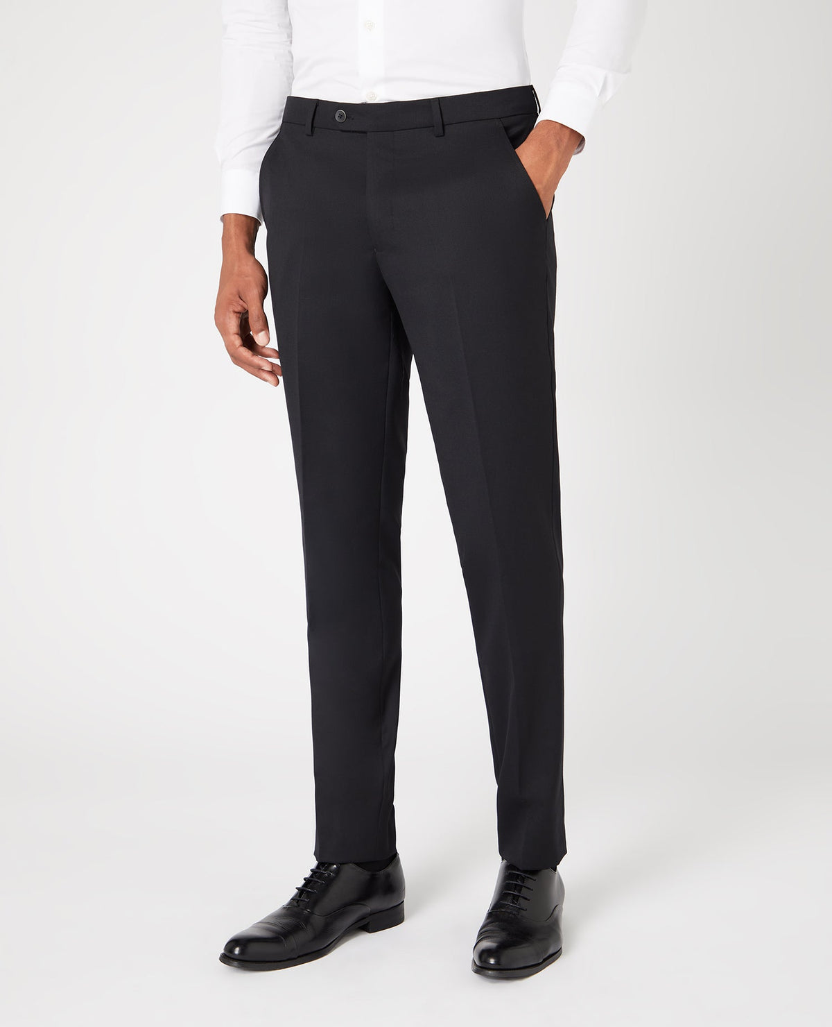 Man wearing a black Slim Fit Wool-Blend Stretch Mix and Match Trousers