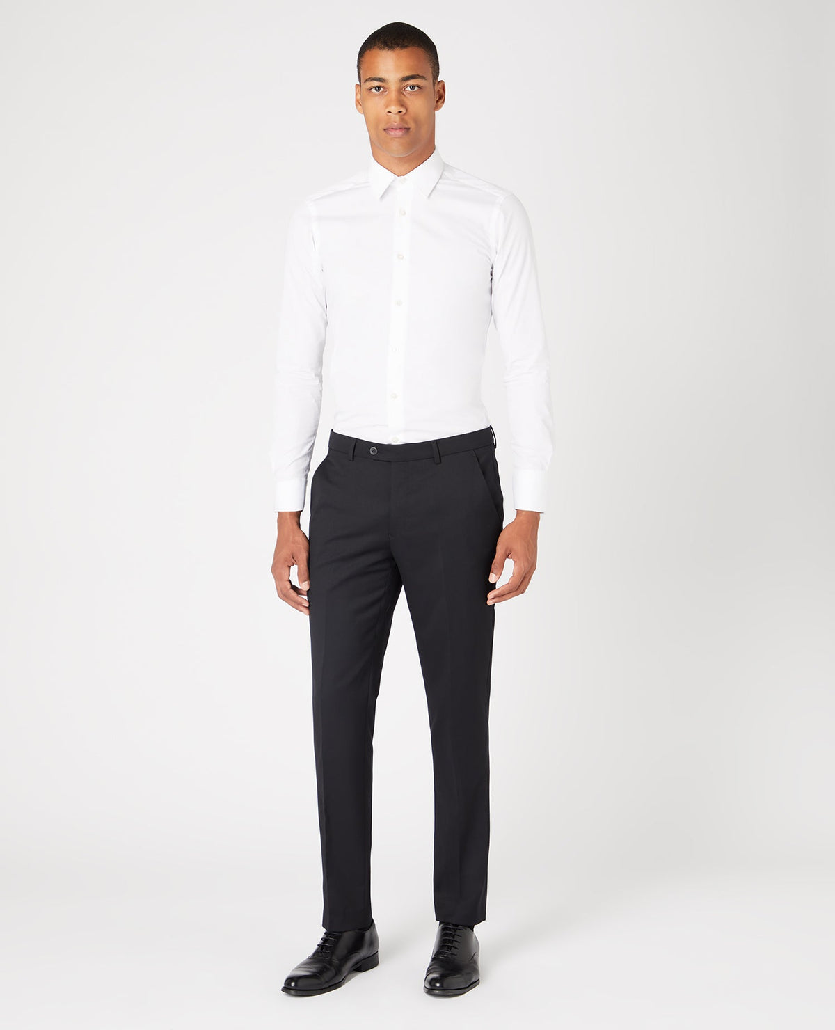 Man wearing a black Slim Fit Wool-Blend Stretch Mix and Match Trousers