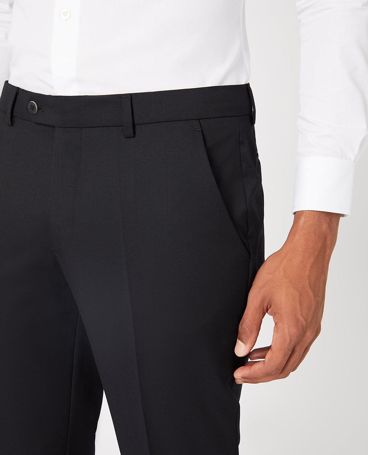 Man wearing a black Slim Fit Wool-Blend Stretch Mix and Match Trousers