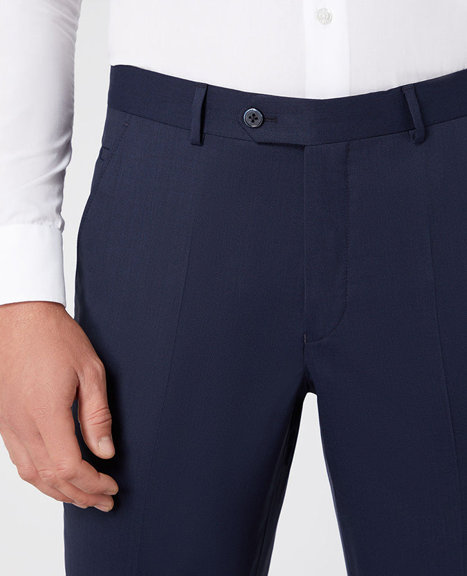 Man wearing a navy Slim Fit Wool-Blend Stretch Mix and Match Trousers
