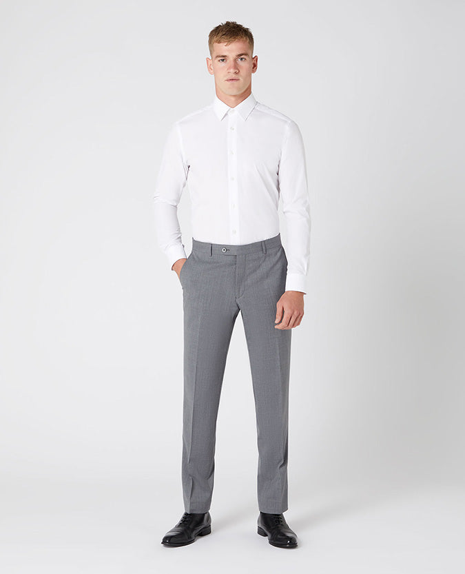 Man wearing a grey Tapered Fit Wool-Blend Stretch Mix and Match Suit Trousers