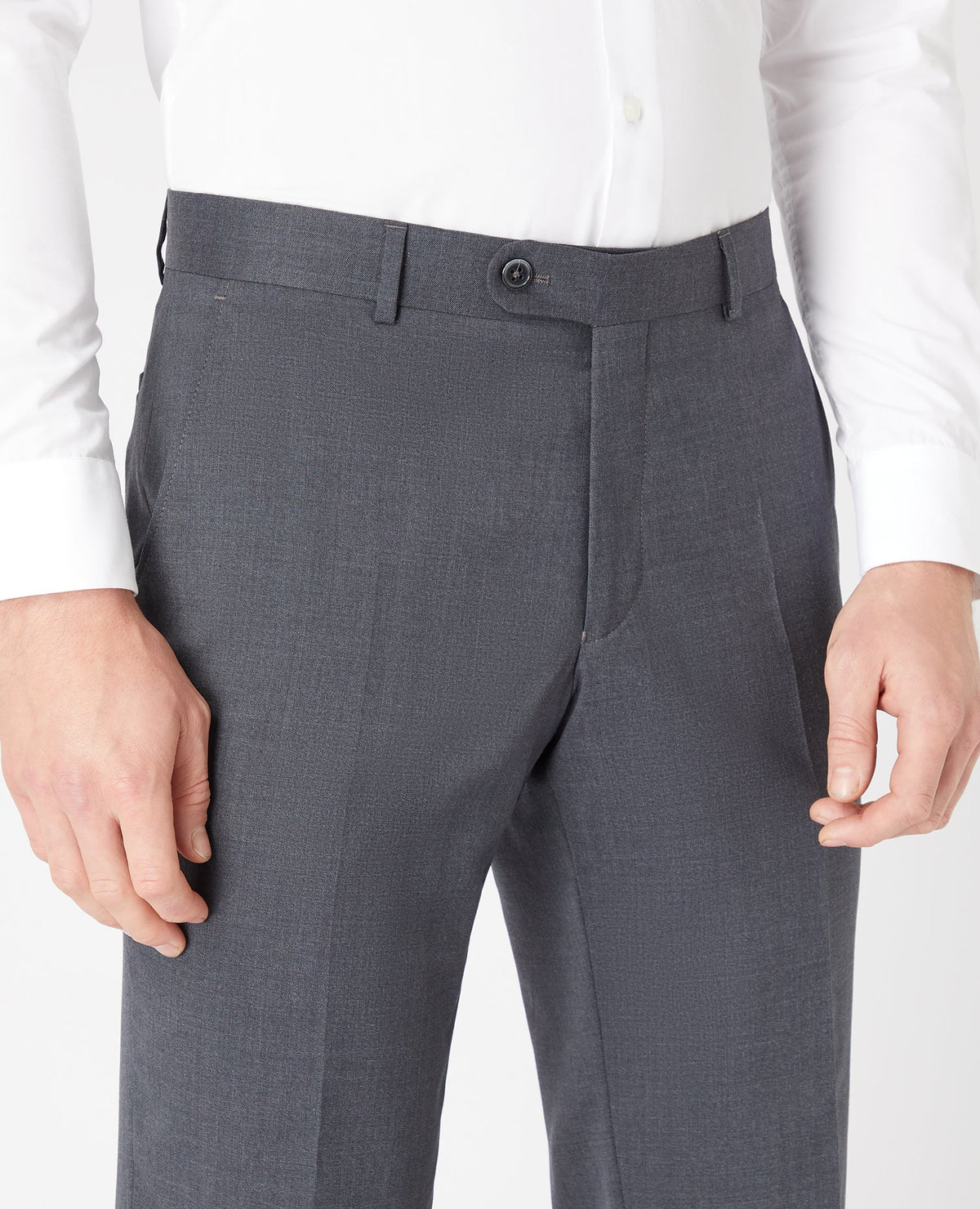 Man wearing a grey Tapered Fit Wool-Blend Stretch Mix and Match Suit Trousers