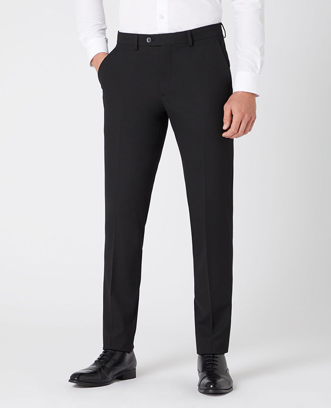 Man wearing a black X-Slim Leg Stretch Formal Trousers