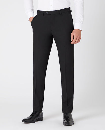Man wearing a black X-Slim Leg Stretch Formal Trousers