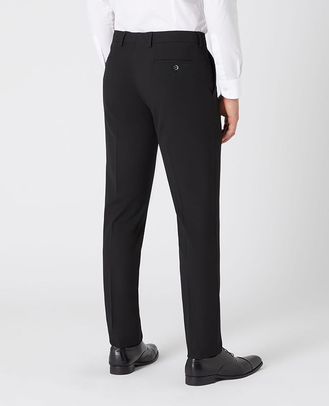 Man wearing a black X-Slim Leg Stretch Formal Trousers