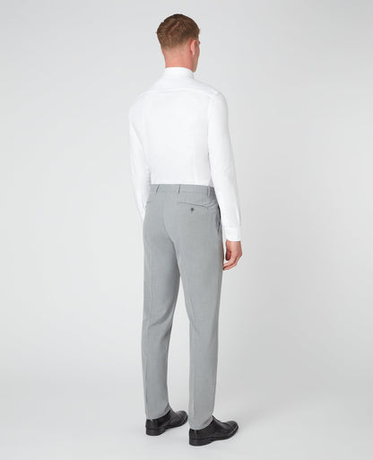 Man wearing a grey X-Slim Leg Stretch Formal Trousers