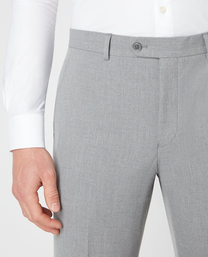 Man wearing a grey X-Slim Leg Stretch Formal Trousers