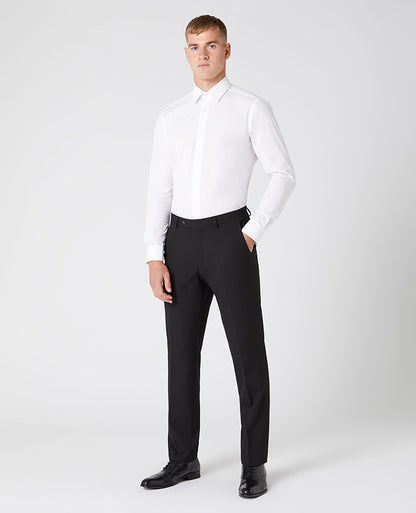 Man wearing a black Tapered Leg Stretch Formal Trousers .