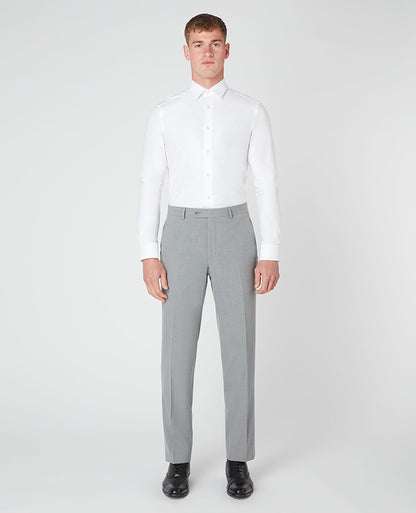 Man wearing a grey Tapered Leg Stretch Formal Trousers .