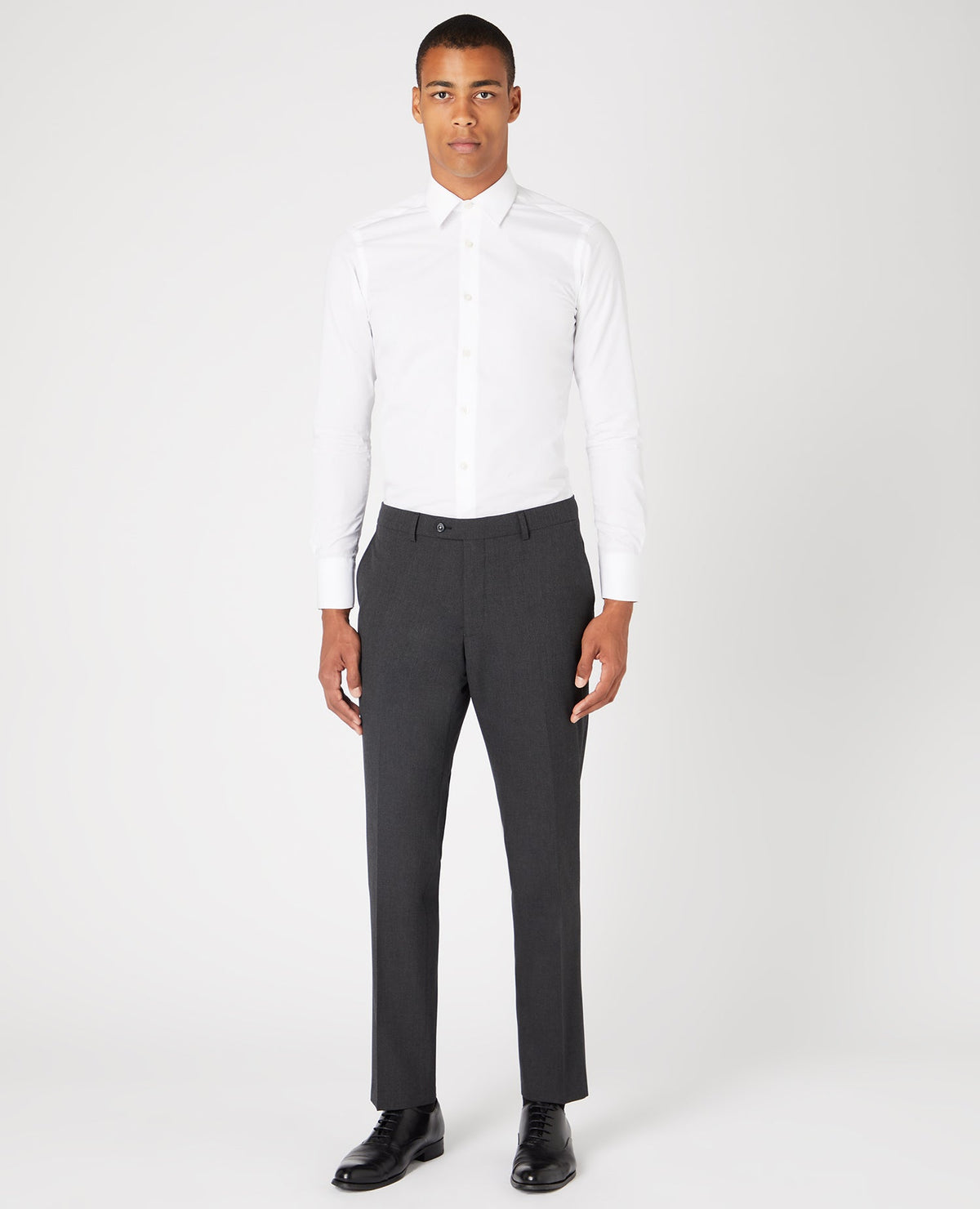 Man wearing a grey Tapered Leg Stretch Formal Trousers
