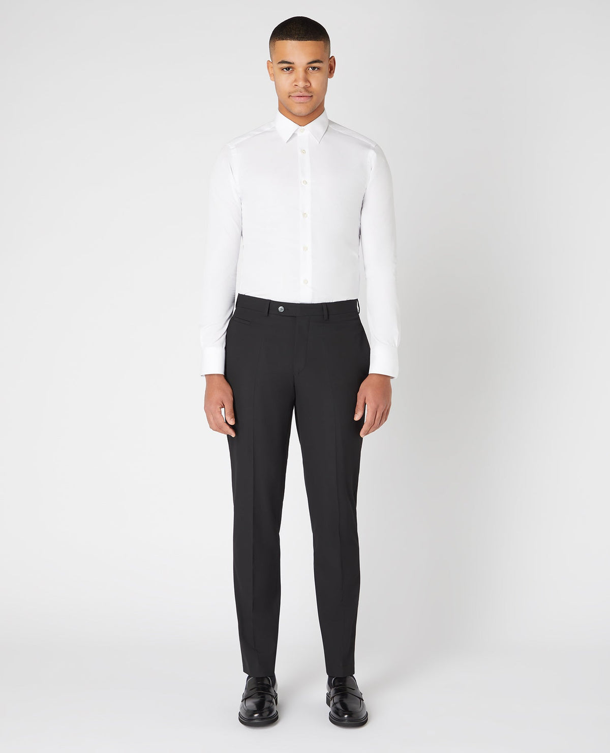 Man wearing a black Slim Leg Stretch Formal Trousers