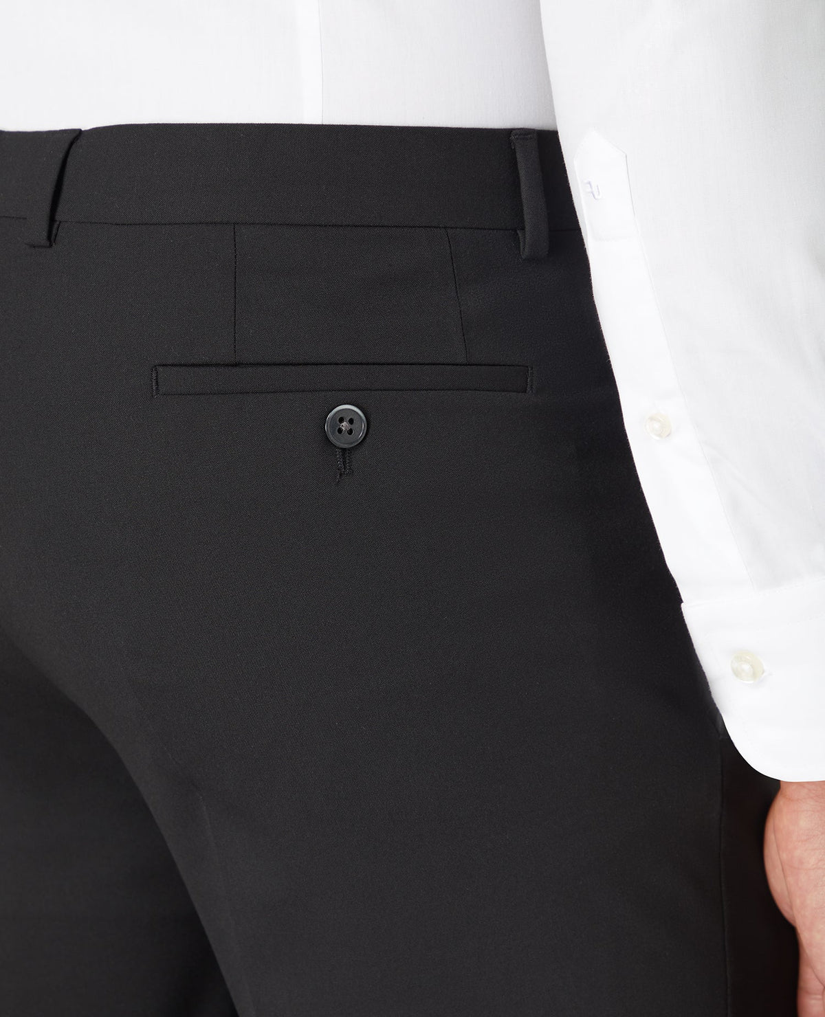 Man wearing a black Slim Leg Stretch Formal Trousers