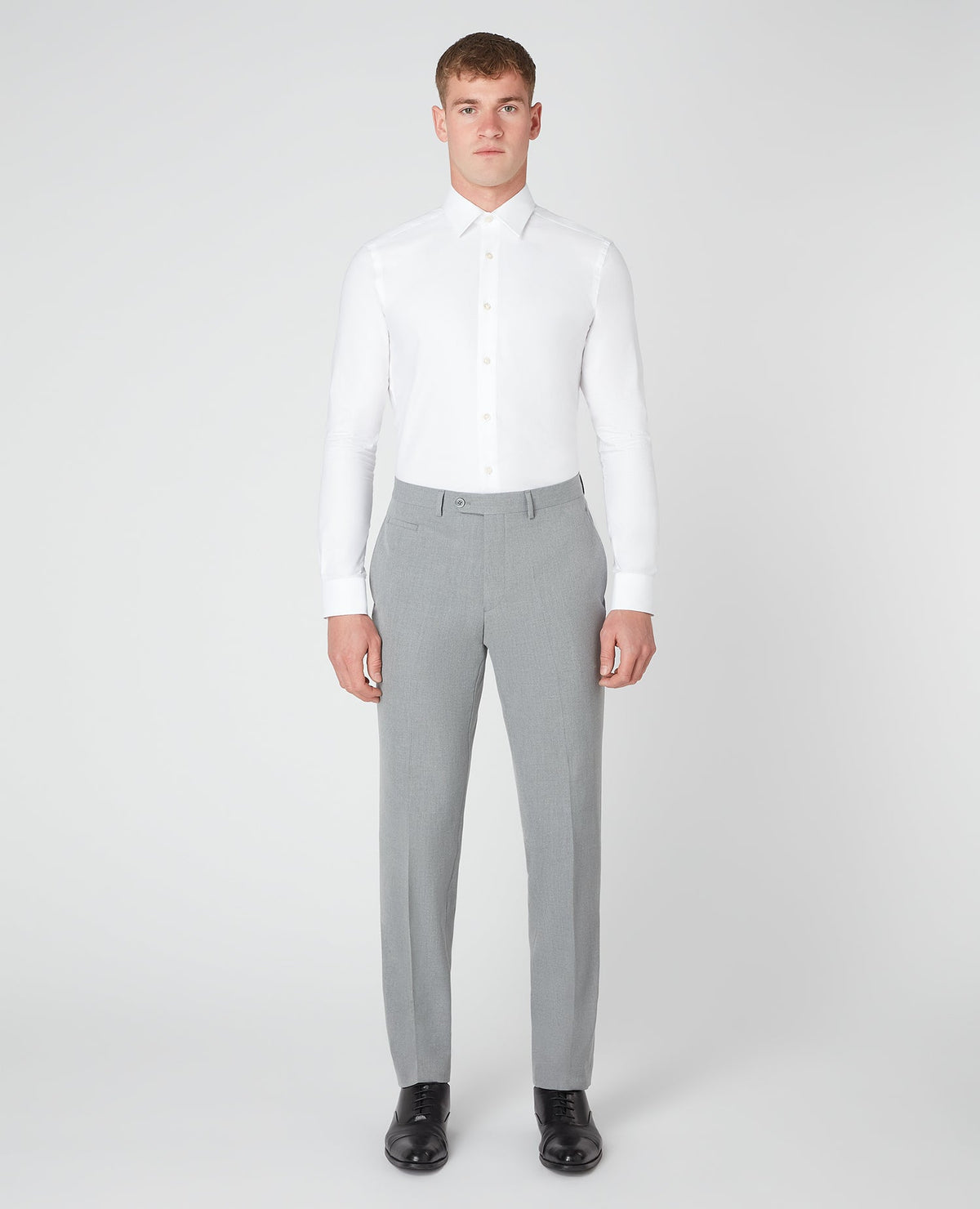 Man wearing a grey Slim Leg Stretch Formal Trousers