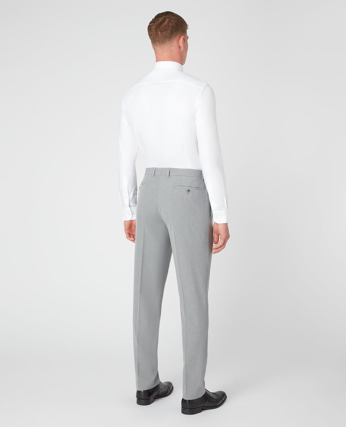 Man wearing a grey Slim Leg Stretch Formal Trousers