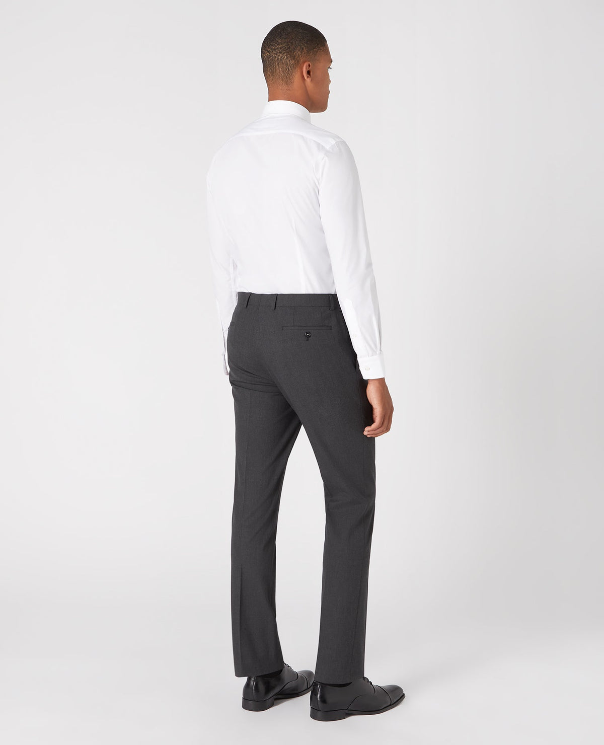 Man wearing a grey Slim Leg Formal Trousers
