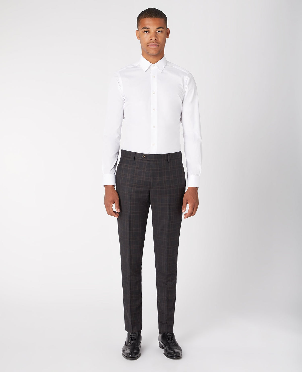 Man wearing a grey X-Slim Mix And Match Checked Suit Trouser