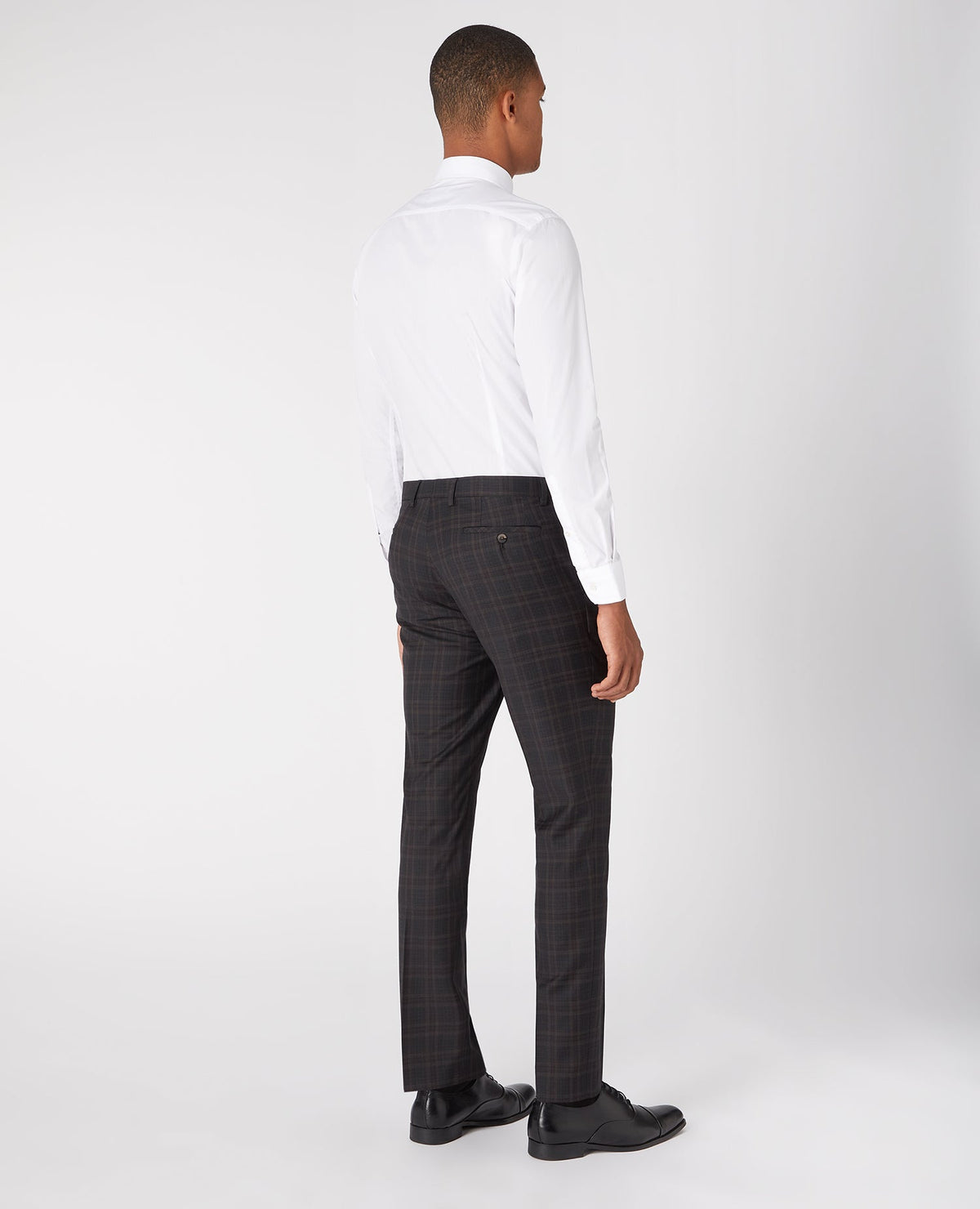 Man wearing a grey X-Slim Mix And Match Checked Suit Trouser