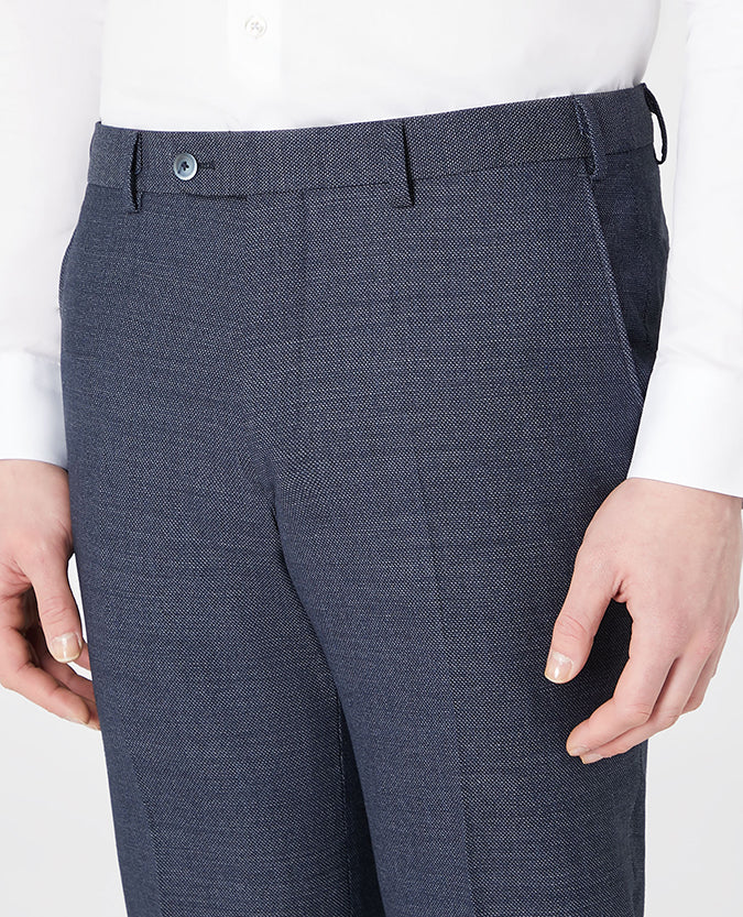 Man wearing a blue Tapered Leg Suit Trouser